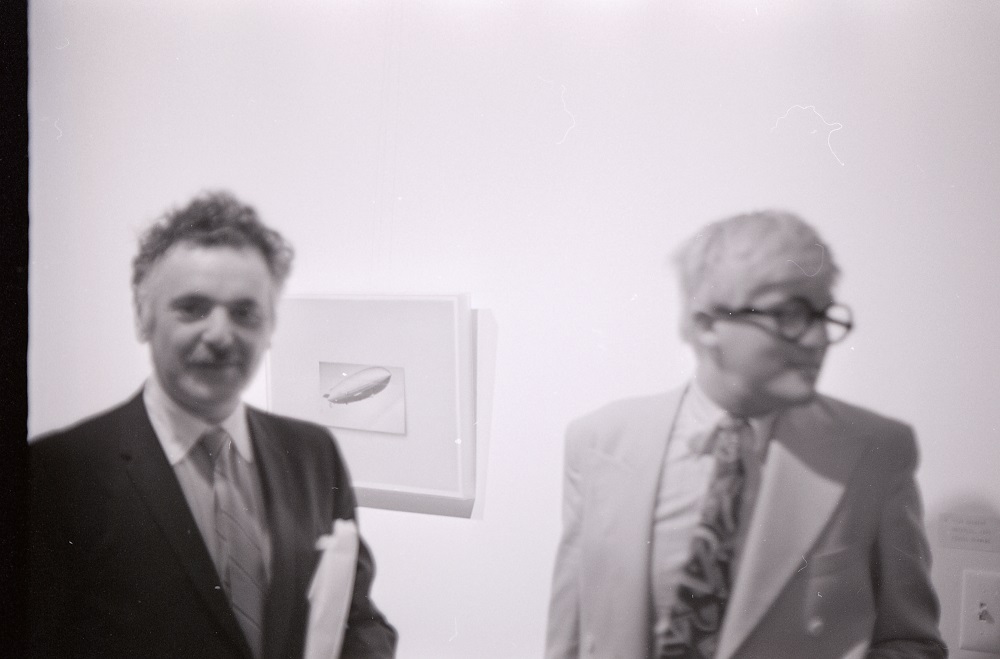 David Hockney (right) and John Coplans, founder of the University Art Gallery. [All photographs from Beth Koch Photographs (AS-051). Box 6: 6.]