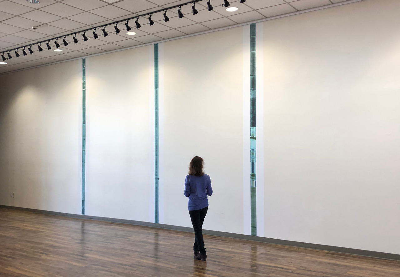 woman walking in gallery